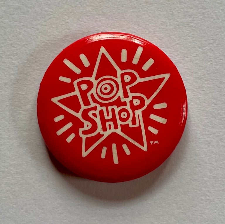 Item #1460 Pop Shop Button (Red/White, 1986). Keith Haring.